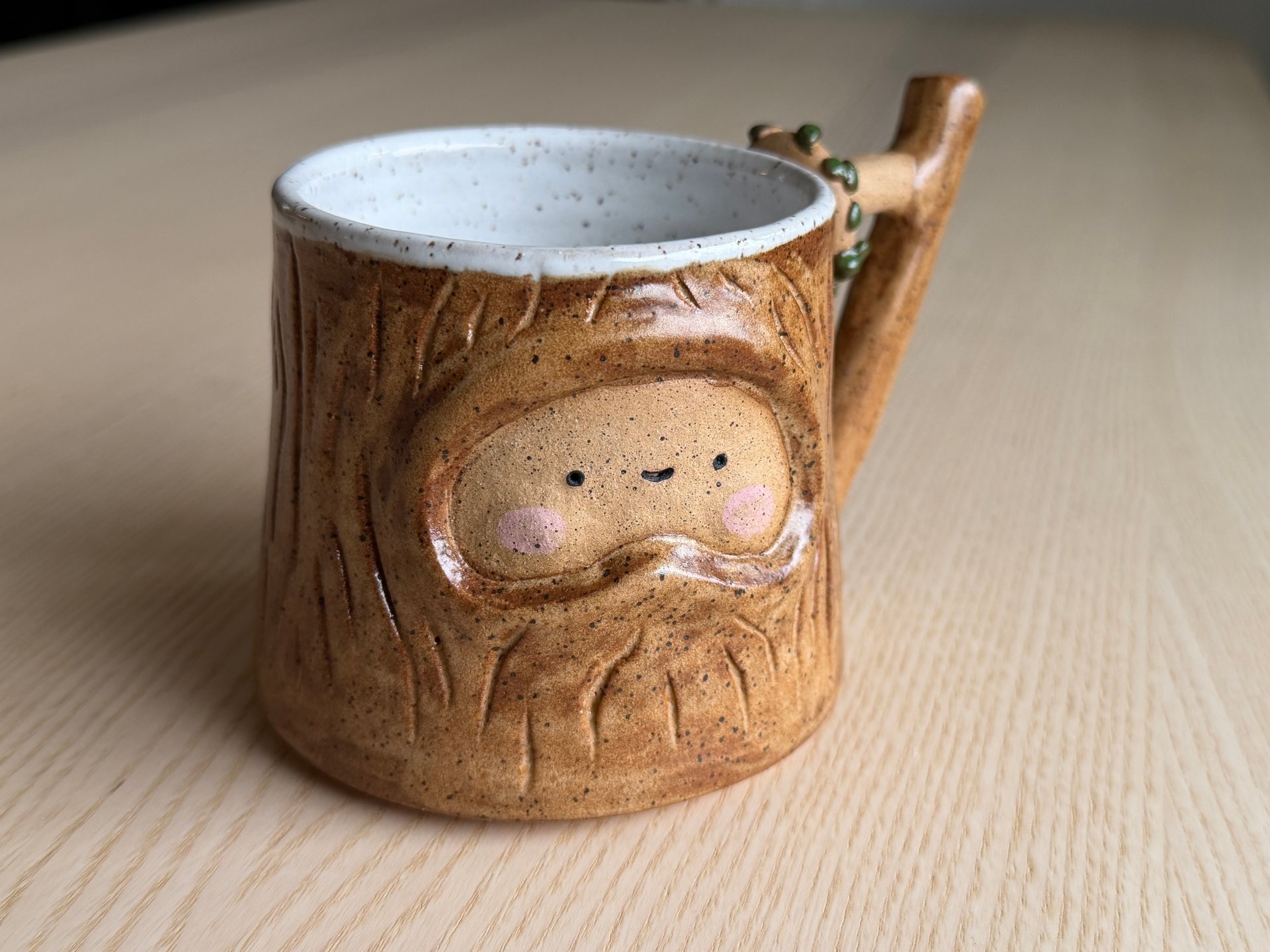The honey mug seen whole from a little further back